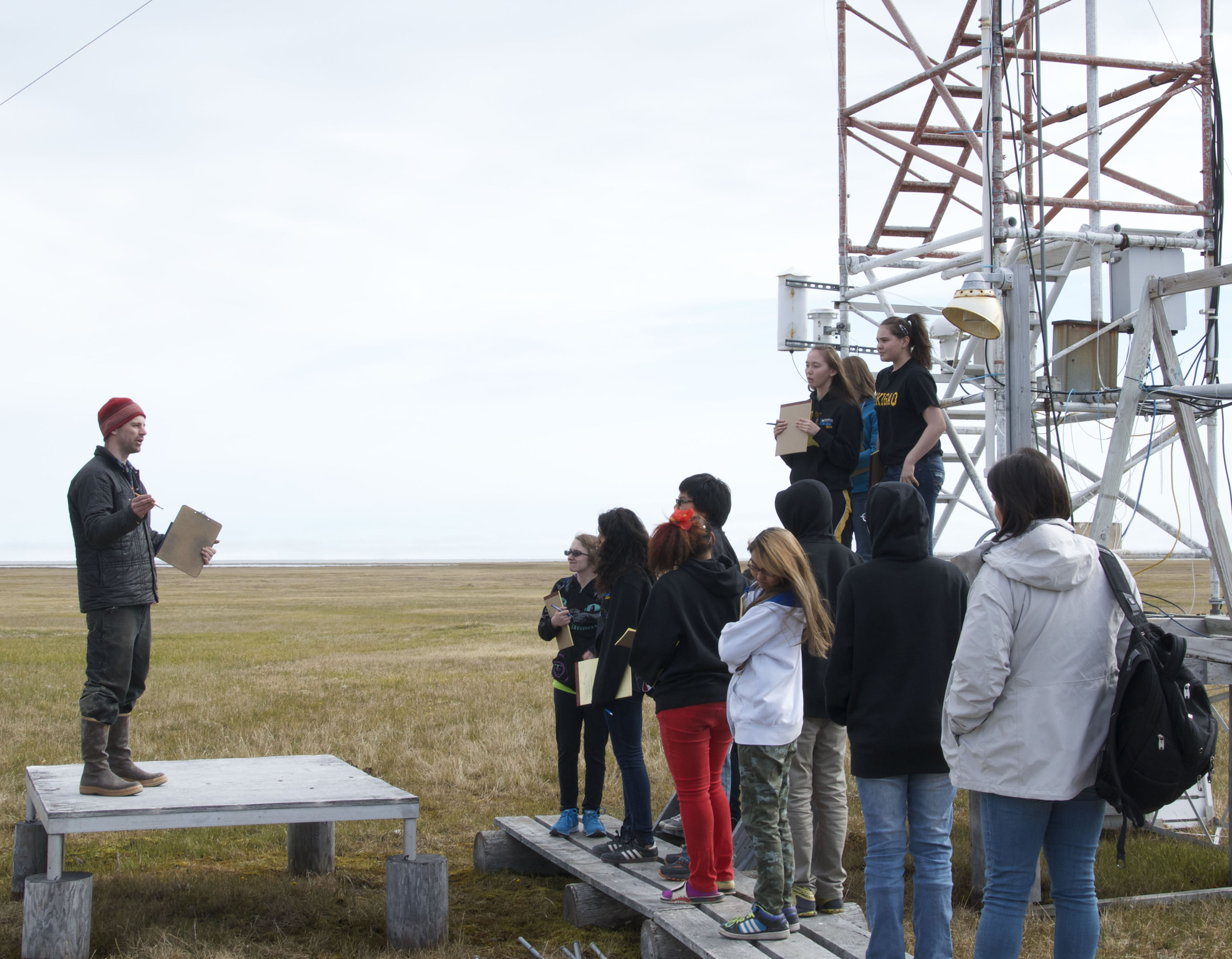 Marty Martinsen, NOAA technician, discusses observatory science with local students.