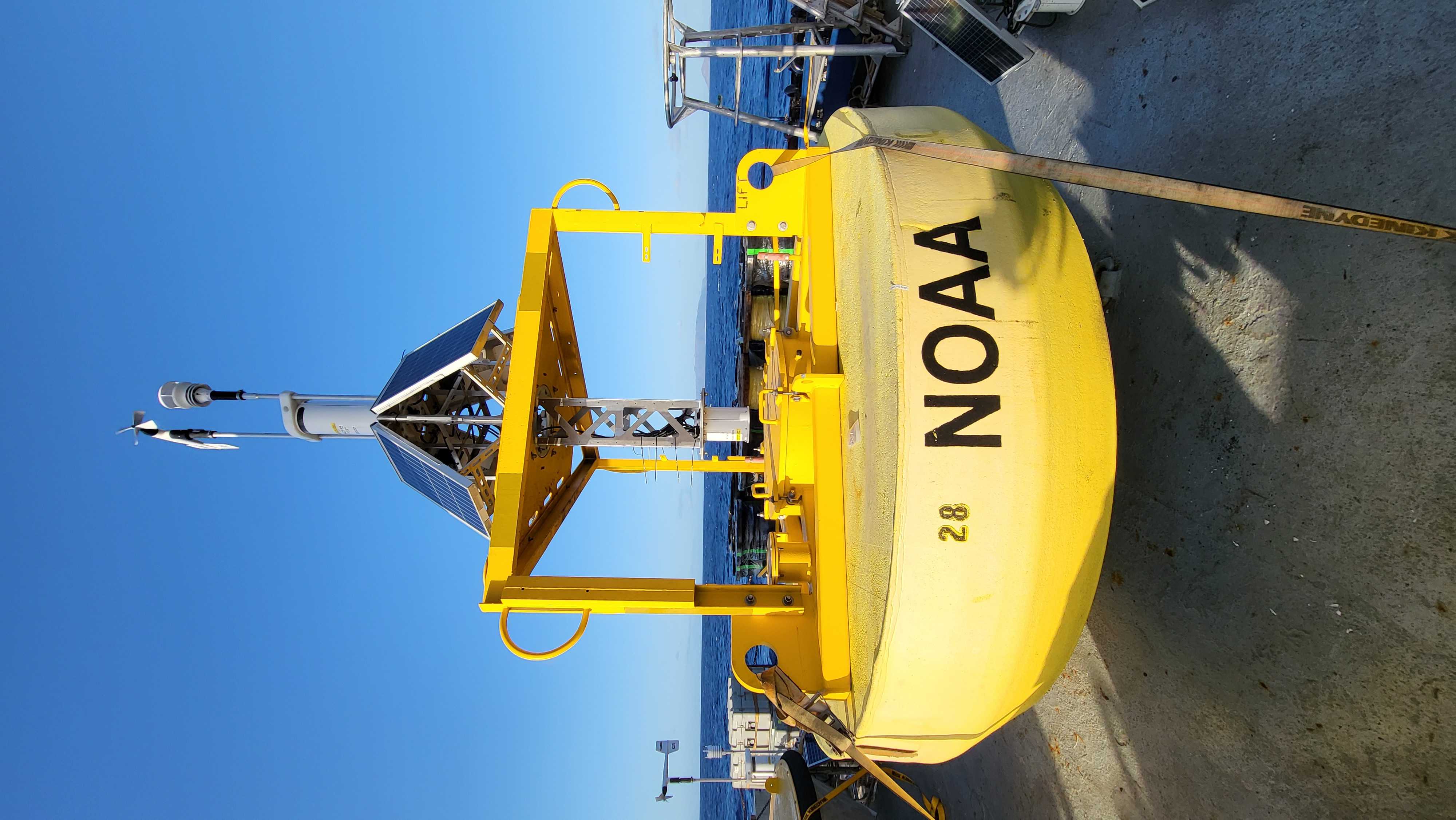 Servicing the TAO array took 34 days. The ship docked in Honolulu, Hawaii, where staff restocked supplies and rotated in a relief crew. A few days later the new crew began the next leg of the mission, where they inspected and repaired weather buoys surrounding the Hawaiian Islands. Shown here is a NOAA weather buoy ready to be deployed 300 miles off the coast of Honolulu. The buoy is nearly 10 feet in diameter, over 12 feet tall, is powered by solar panels and hosts eight sensors. 