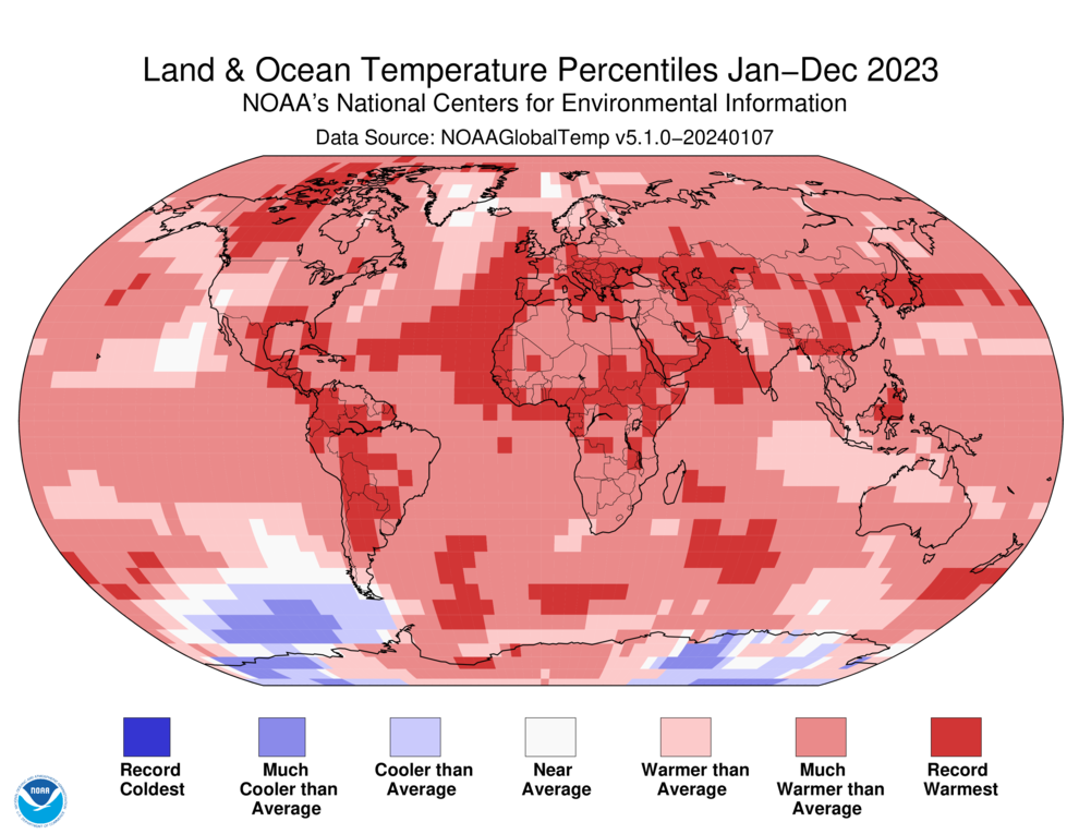 A world map plotted with color blocks depicting percentiles of global average land and ocean temperatures for the full year 2023. Color blocks depict increasing warmth, from dark blue (record-coldest area) to dark red (record-warmest area) and spanning areas in between that were "much cooler than average" through "much warmer than average." 