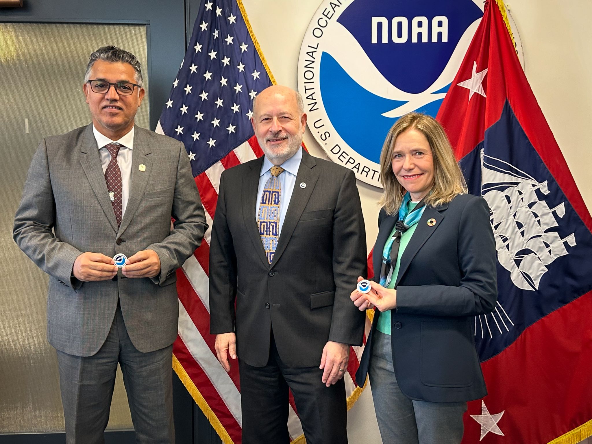 Dr. Rick Spinrad, Under Secretary of Commerce for Oceans and Atmosphere and NOAA Administrator standing with Dr. Celeste Saulo, Secretary General of the WMO and Dr. Abdulla Al Mandous, WMO President