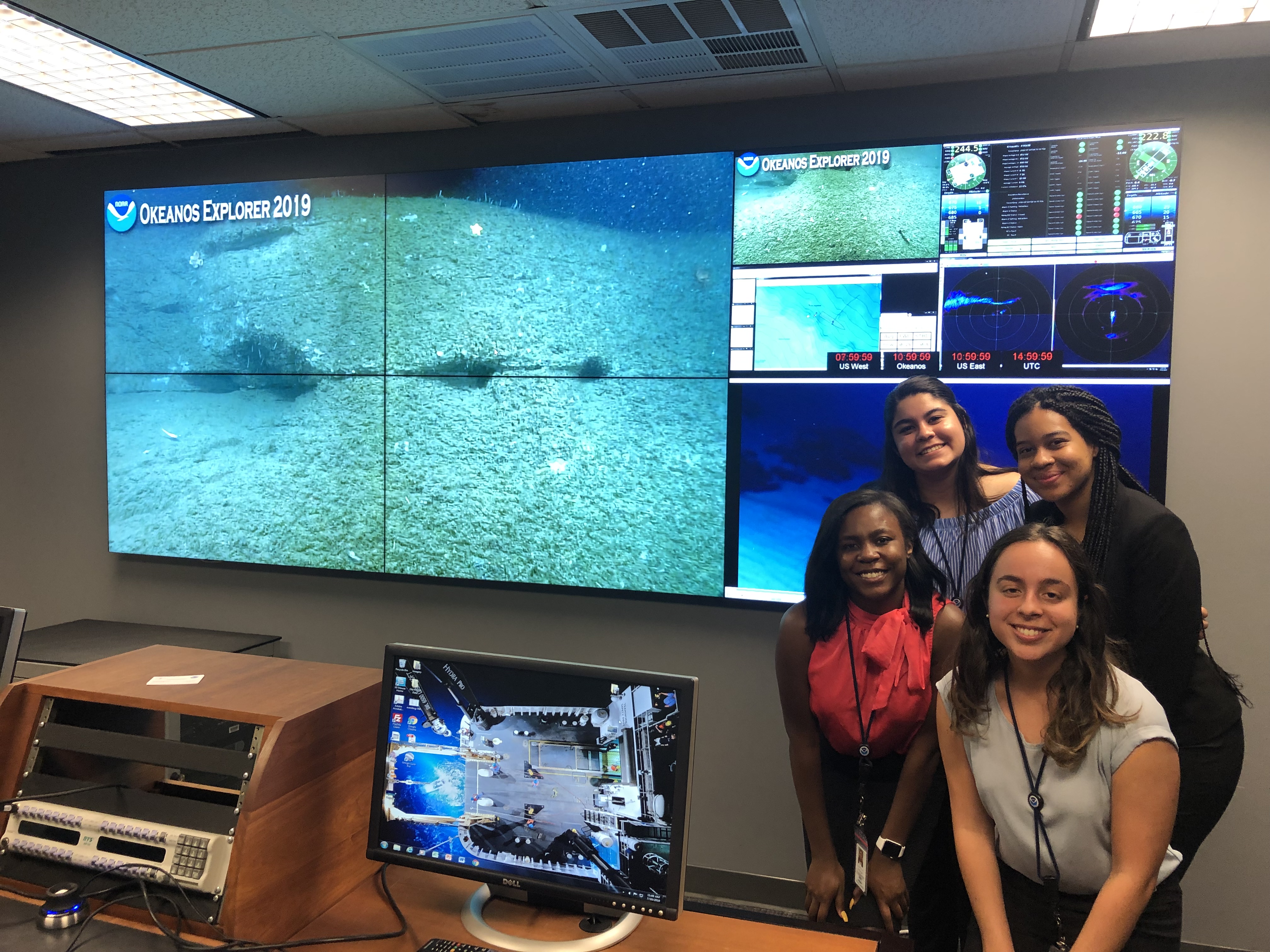 Educational Partnership Program with Minority Serving Institutions scholars from the class of 2019 view ocean exploration footage from NOAA Ship Okeanos Explorer during scholar orientation at NOAA headquarters in Silver Spring, Maryland. Top row: Jezella Peraza, Elyse Bonner Bottom row: JaNia Dunbar, Paola Santiago