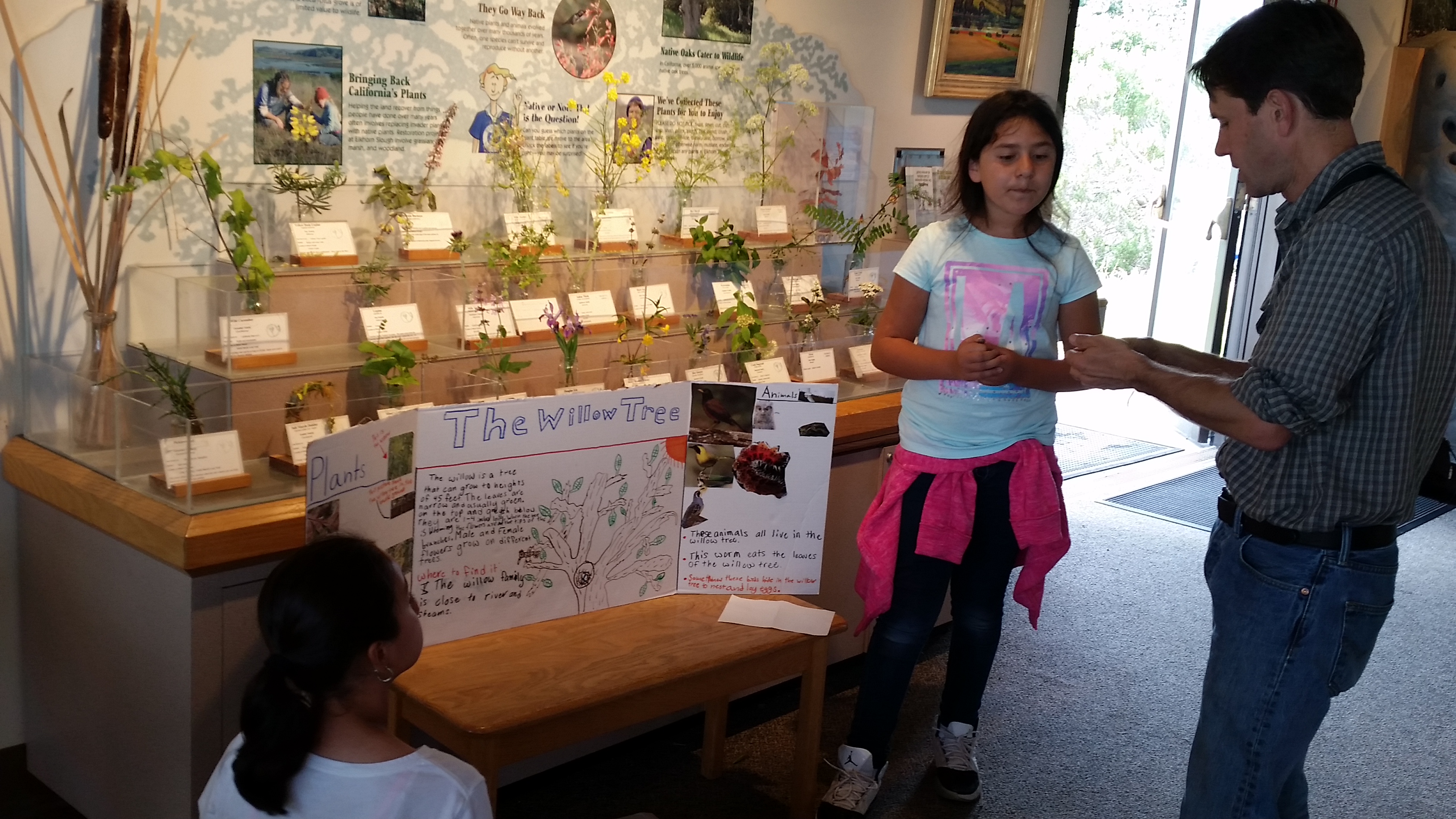 A student presents her project on the willow tree at the Elkhorn Slough National Estuarine Research Reserve.