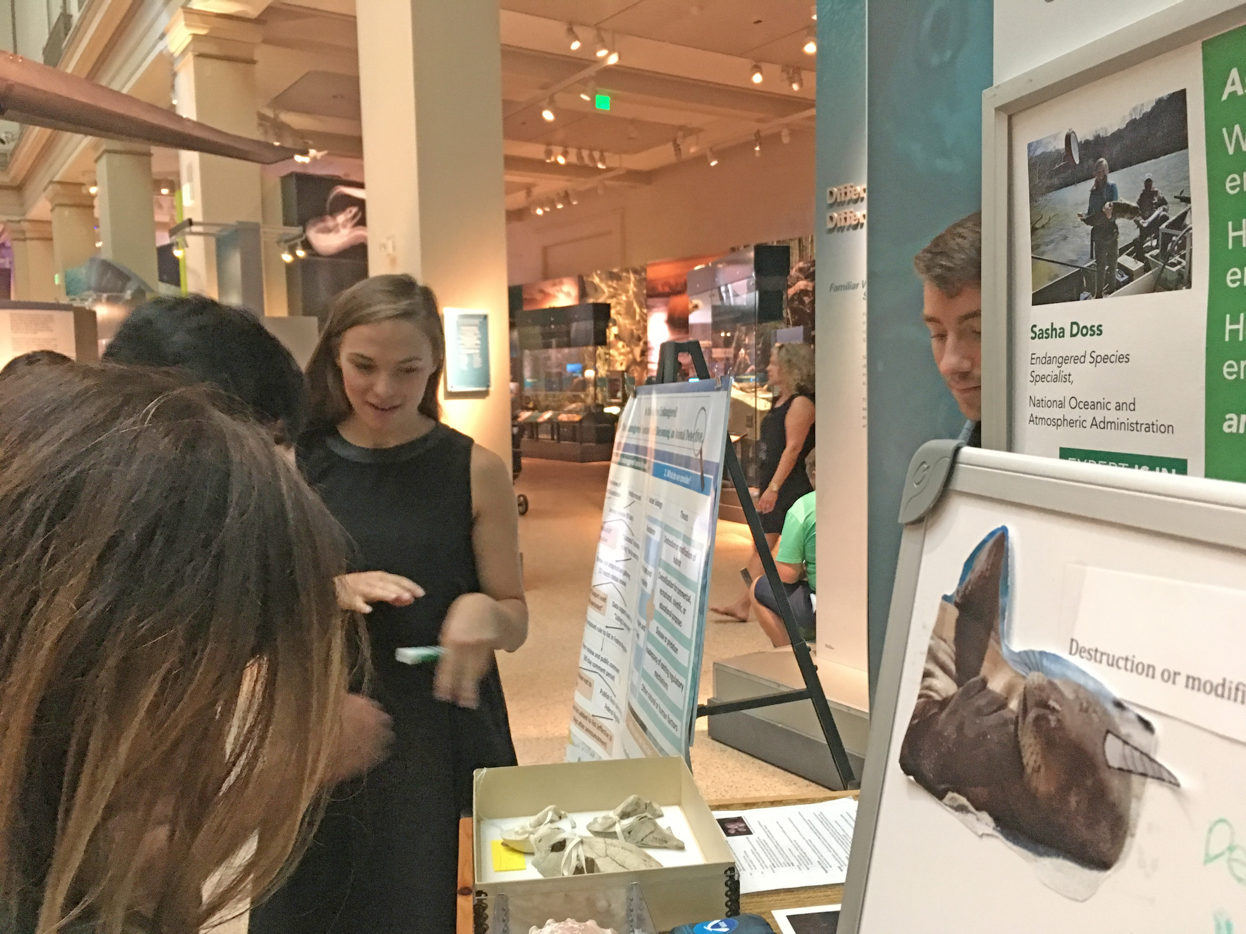 Sasha Doss (2017 Knauss Fellow with NOAA Fisheries) plays an educational game about endangered species with the museum visitors for the Expert Is In Kiosk at the Smithsonian Museum of Natural History.