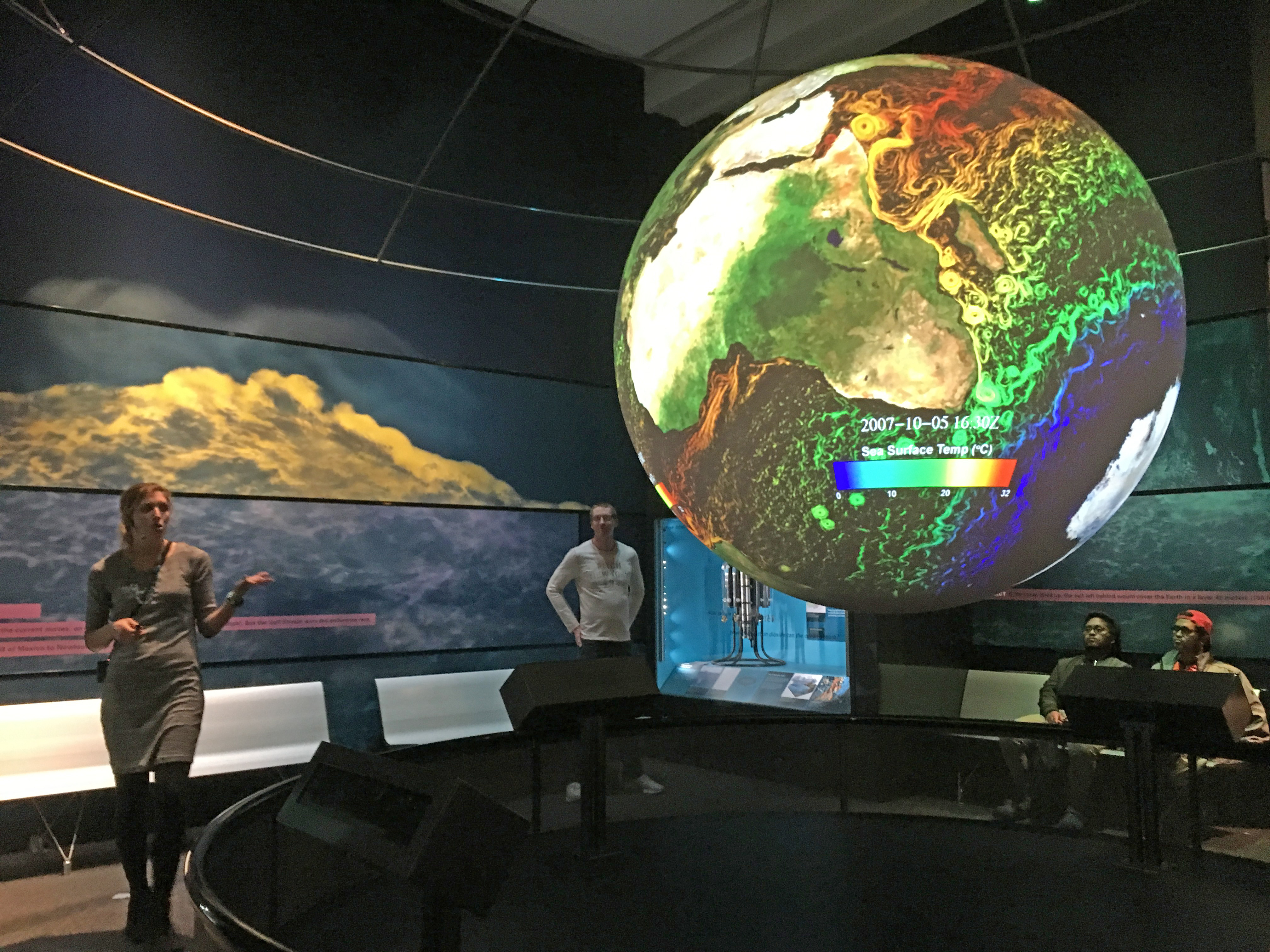 Shelby Brunner (2017 Knauss Fellow with NOAA Climate Program Office) uses Science on a Sphere to explain why we study the ocean for the Expert Is In Kiosk at the Smithsonian Museum of Natural History.