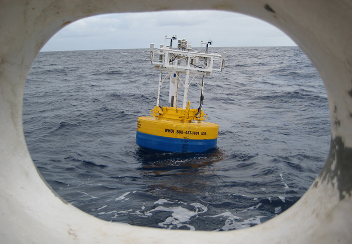 An ocean buoy seen through a hawsehole aboard the NOAA Ship Ron Brown.