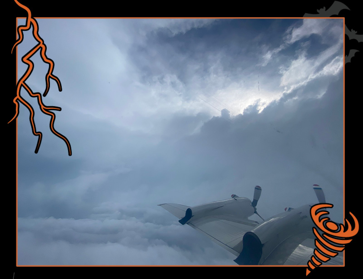 A view of the eye wall of Hurricane Ida from a Hurricane Hunter plane. Border of the photo is black with orange atmospheric graphics of a lightning bolt and a tornado. Text: Hurricane Hunter footage, #NOAASpookyScience with NOAA logo.