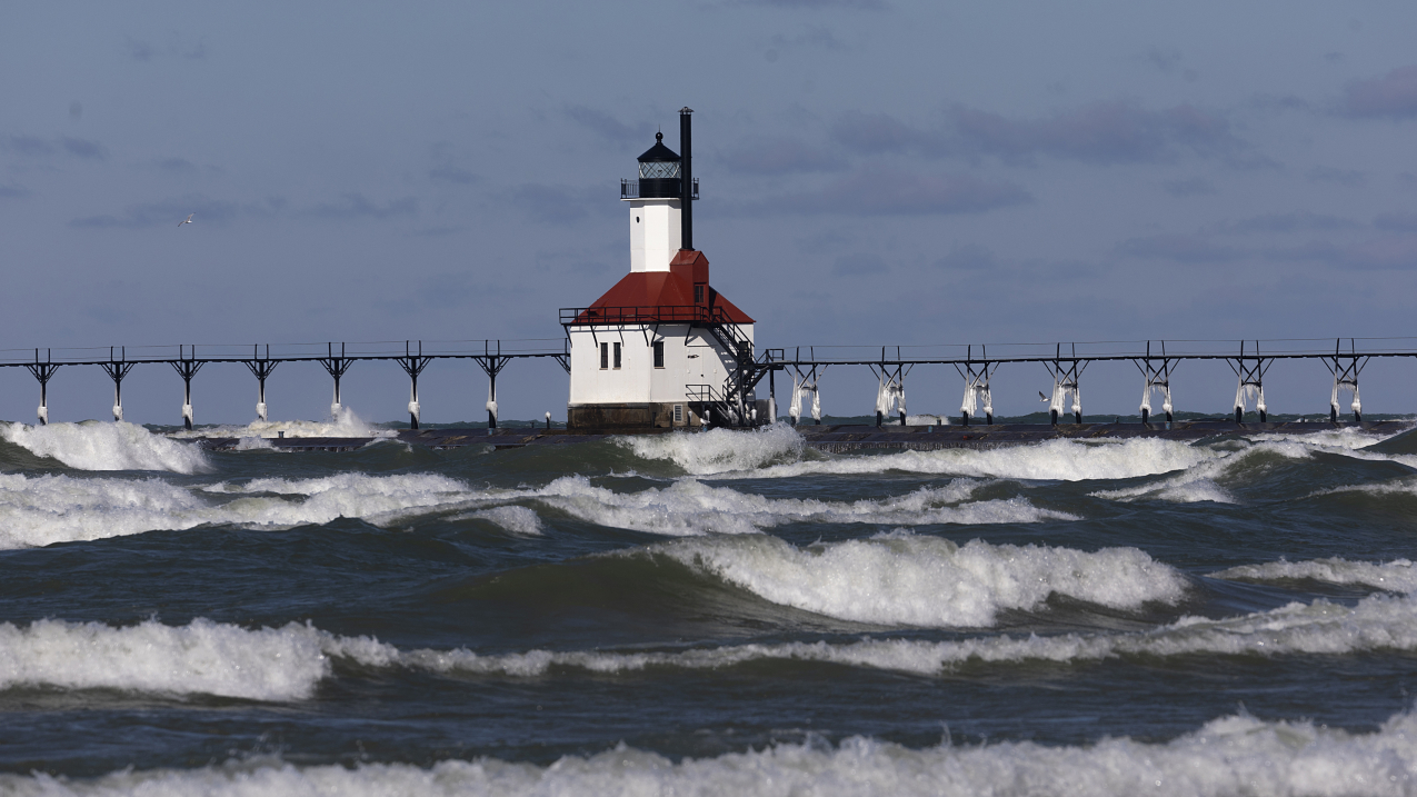 February 18, 2024: Waves roll toward the shore on Lake Michigan in St. Joseph, Michigan.The Great Lakes shorelines are historically ice covered this time of year. Persistent warmth resulted in a steady decrease in ice coverage across the Great Lakes this winter, which reached a historical low of 2.7% on February 11.