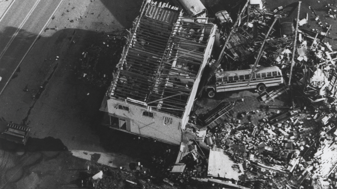 April 3, 1974: A School bus is tossed into a private garage in Brandenburg, Kentucky, during the 1974 tornado Super Outbreak. 