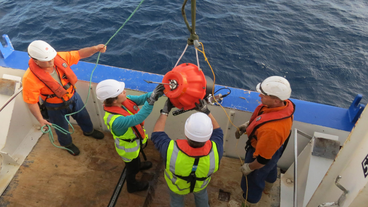 Scientists deploy a Deep Argo float off New Zealand.

