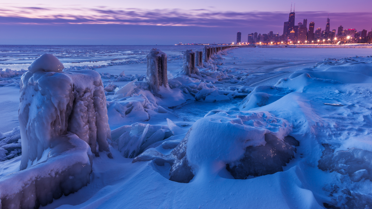 A frozen Chicago lakefront. Even as the Arctic warms, cities in the Northern Hemisphere have experienced outbreaks of extremely cold weather during the last several winters. 
