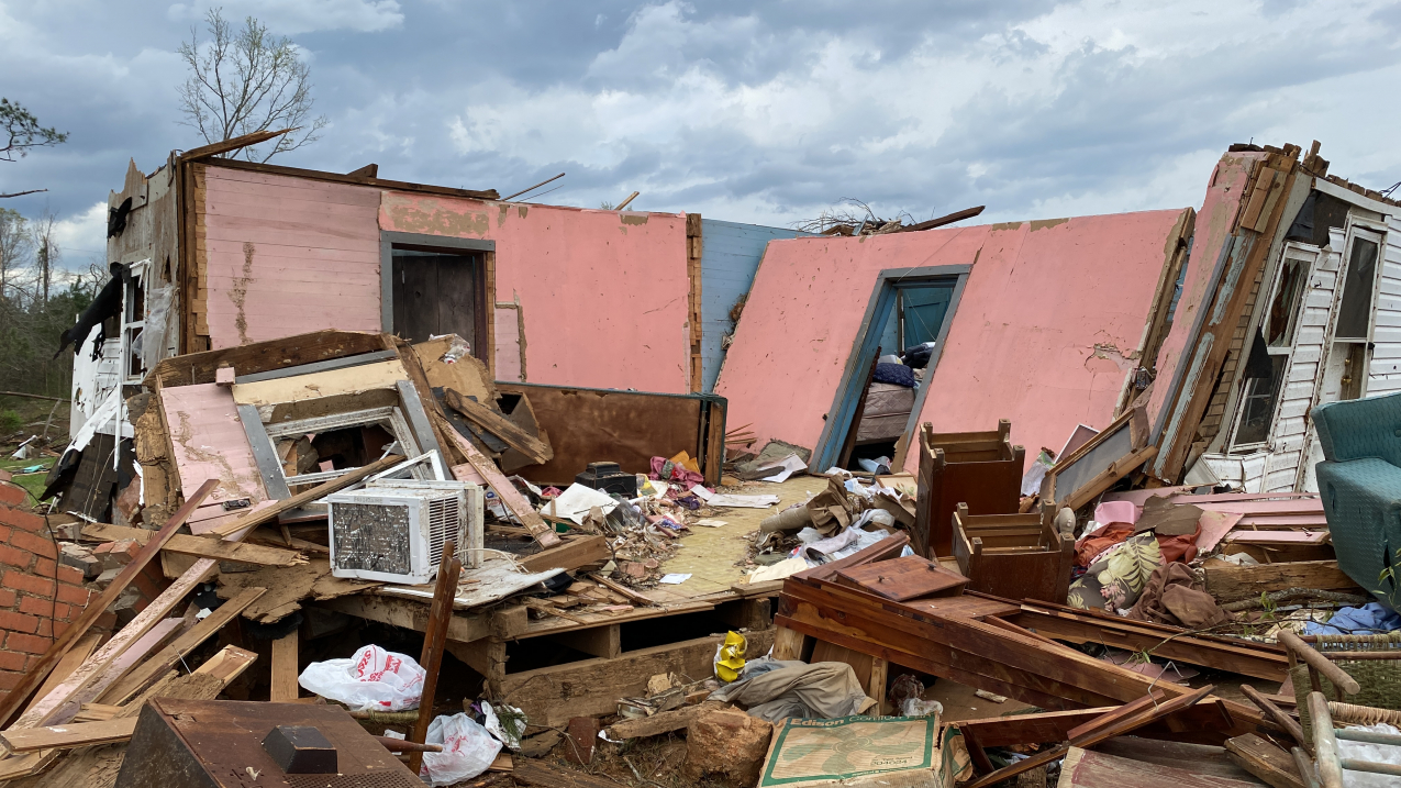A photo of massive damage to a home and yard taken during a NOAA National Weather Service post-storm survey in Alabama after tornadoes ripped through the region on March 25, 2021.