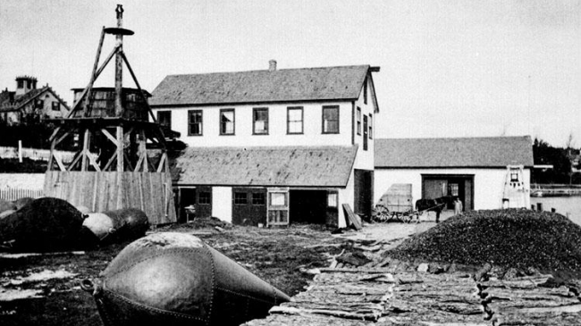 This photo shows the original U.S. Fisheries Commission lab building in Woods Hole, MA in 1875.