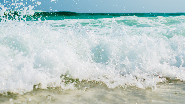 Pictured: waves on a beach.
