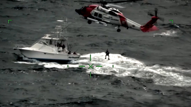 The U.S. Coast Guard rescues 7 from a sport fishing boat south east of Cape May, New Jersey, on July 26, 2021. The crew of the vessel activated their Emergency Position Indicating Radio Beacon (EPIRB) when conditions continued to deteriorate. 