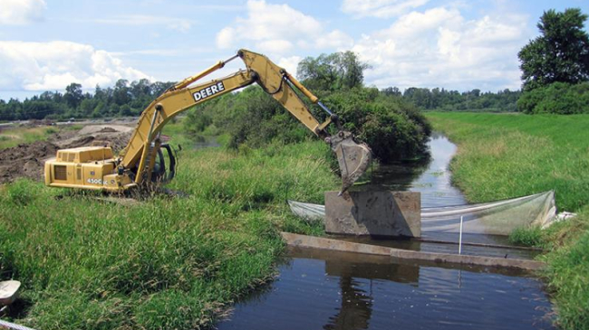 Construction at the Fisher Slough habitat restoration project in Washington. The project provided habitat for salmon while also reducing the risk of flooding.