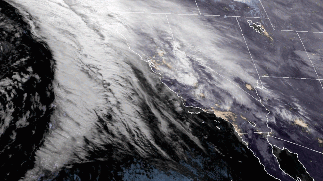 NOAA GOES West satellite imagery from January 4, 2023. Clouds are shown in white. An atmospheric river can be seen funneling moisture over the coast of Oregon, Washington and Northern California.