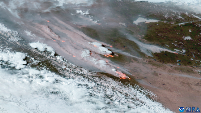 A large cluster of wildfires burns in Alberta, Canada, as seen from NOAA’s GOES-18 satellite on May 5, 2023. May 2023 was North America’s warmest May in NOAA’s 174-year climate record.