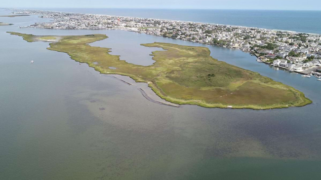 Mordecai Island, New Jersey, protects the Back Bay areas of Long Beach Island. In 2015, part of the salt marsh island was restored with dredged material and planted with native vegetation. 