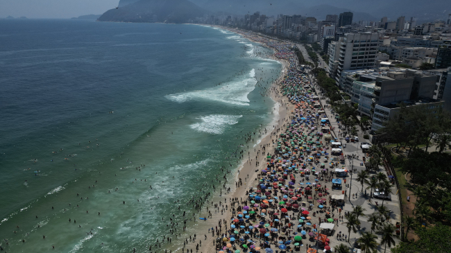 November 15, 2023: An aerial view of people enjoying the beach amid a record-breaking heat wave at Ipanema Beach in Rio de Janeiro, Brazil. November 2023 was South America’s warmest November ever recorded.