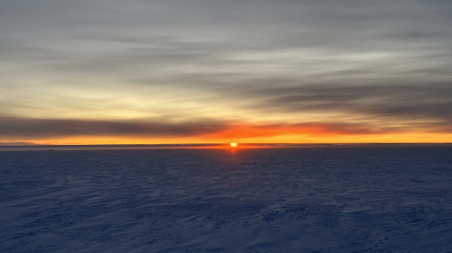 This March 20, 2024 sunset at the South Pole signaled the return of fall in the Southern Hemisphere, and six months of darkness for NOAA staff at the South Pole Observatory.