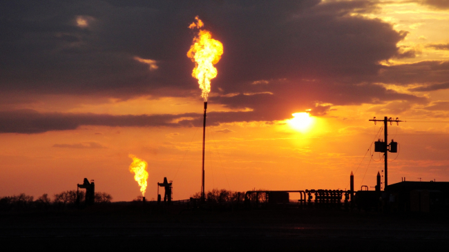 Fossil fuel extraction in North Dakota's Bakken field in 2014.