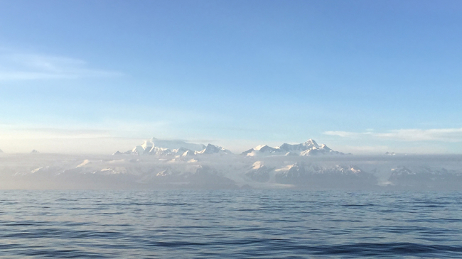 In this photo, the Pacific ocean is shown with mountains in the distance. The most famous example of an ocean gyre’s tendency to "take out our trash" is the Great Pacific garbage patch located within the North Pacific Gyre. 