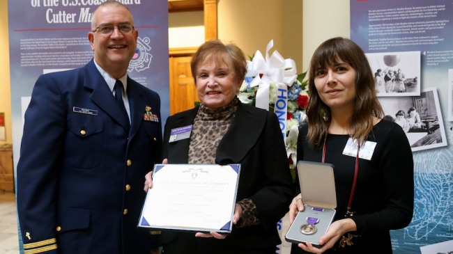  “The Muskeget weathermen legacy of 'service above self' lives on with the men and women of National Weather Service today,” said National Weather Service Director Louis Uccellini. In this photo, Chaplain LT Larry Brant stands with relatives of posthumous Purple Heart Medal recipient Luther Brady at a ceremony in the Georgia State Capitol building in Atlanta, Dec. 13, 2016. 