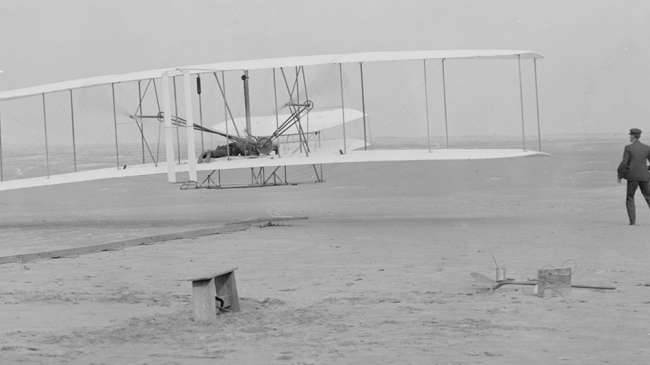 This photograph shows the first powered, controlled, sustained flight. Today, we fly using technological advances that the Wright Brothers only could have imagined. 