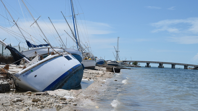 Sailboats and personal craft litter the shoreline near Naval Air Station Key West, Florida, Sept. 15, 2017, following Hurricane Irma. 