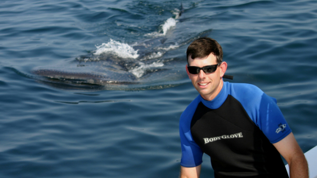 NOAA shark scientist Eric Hoffmayer, with whale shark.