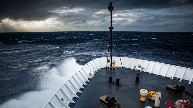 The Okeanos Explorer beats its way into heavy seas.