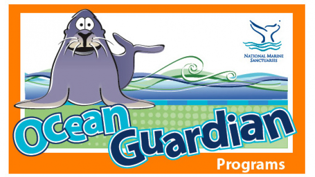 A graphic of a seal hopping onto land. Text: Ocean Guardian Programs with the National Marine Sanctuaries logo.