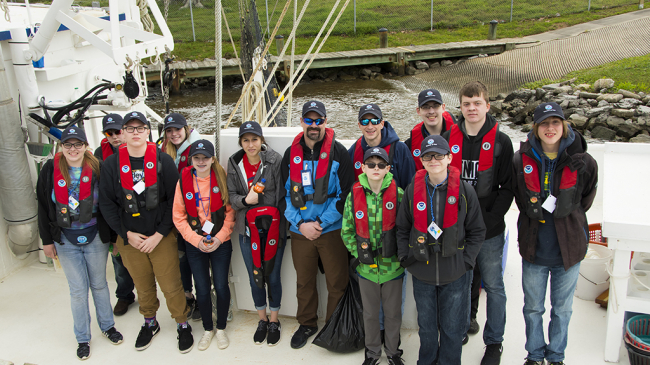 Teacher at Sea Alumnus Spencer Cody (NOAA Ship Pisces, 2014) and his students, visiting from South Dakota, get ready for a day trip on the Southeast Fisheries Science Center's R/V Caretta out of Pascagoula, Mississippi, in 2019.