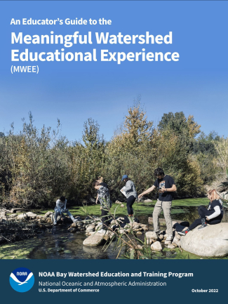 The cover photo of "An Educator's Guide to the Meaningful Watershed Educational Experience." The background photo is of students testing water quality along an algae covered river. At the bottom of the page it has the NOAA logo and reads "NOAA Bay Watershed Education and Training Program, National Oceanic and Atmospheric Administration, U.S. Department of Commerce, October 2022."