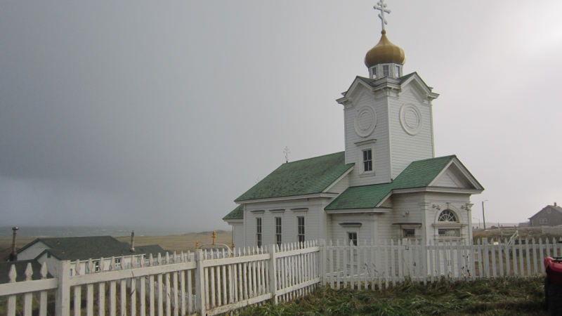 The Orthodox Church remains a strong force in the St. Paul community, standing steadfast as a rainstorm approaches from the island's southern coast.