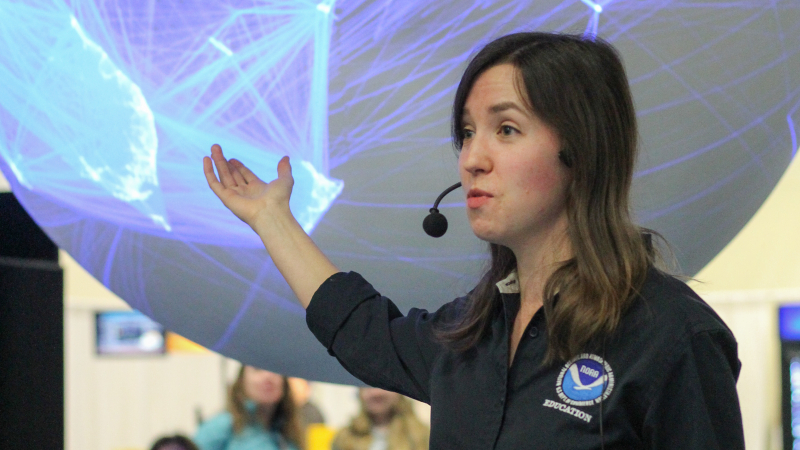 Lauren Gibson, Knauss class of 2018, talks to the public about the interconnectedness of ocean issues. This presentation, which used NOAA’s Science On a SphereⓇ technology, took place at the USA Science & Engineering Festival in Washington, DC, on April 7, 2018.