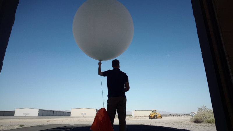 Connor Dennhardt, a 2015 Pathways Intern, releases weather ballon in El Paso, Texas.
