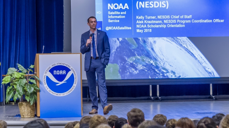 Alek Krautmann, a NOAA Hollings scholar from the class of 2008, revisited the undergraduate scholarship orientation program 10 years later, but this time, he was the one on stage! Krautmann volunteered to speak to the incoming class of Hollings scholars in 2018 about the National Environmental Satellite, Data, and Information Service, a line office within NOAA that Krautmann now works for.