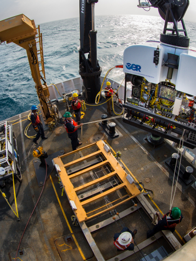 Okeanos Explorer's dual-body ROV system is loaded from the aftdeck of the ship into the water before conducting an exploration dive.
