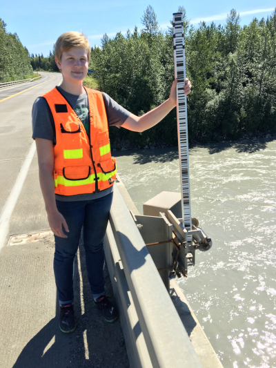 Hollings Scholar Bailey Anderson surveying on the Matanuska River during her internship with the National Weather Service in Alaska.