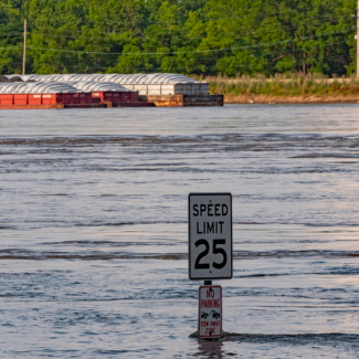 Mississippi River Flooding with Speed Limit Street Sign