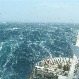 A research vessel ploughs through the waves, braving the strong westerly winds of the Roaring Forties in the Southern Ocean in order to measure levels of dissolved carbon dioxide in the surface of the ocean.