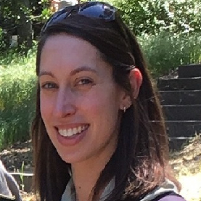 Lara poses in US Forest Service uniform