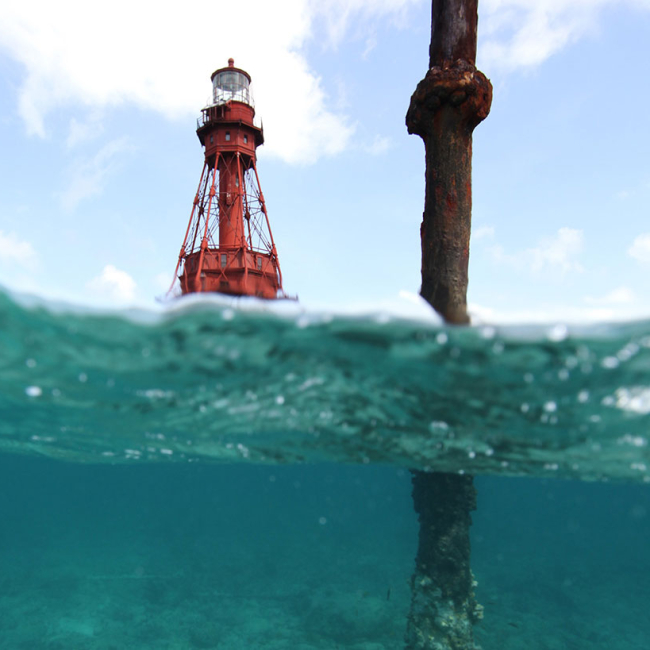 The rusty remnants of a Totten Beacon (foreground) located near American Shoal lighthouse.