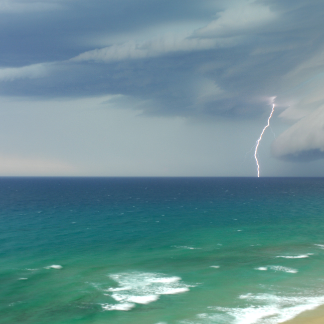 Lightning near a beach.