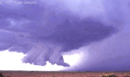 Wall cloud extending below the base of a supercell.