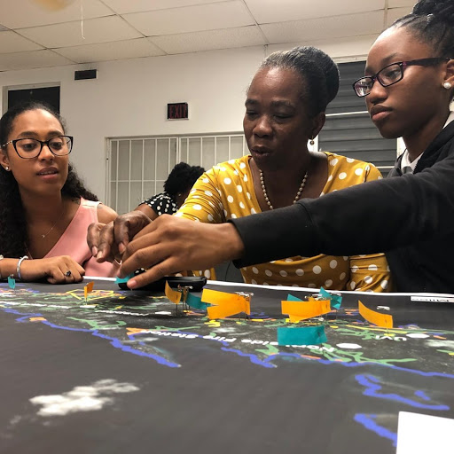 Participants assessing their community vulnerabilities and discussing ways to become more resilient during Week 4 of the USVI Storm Strong Workshop.