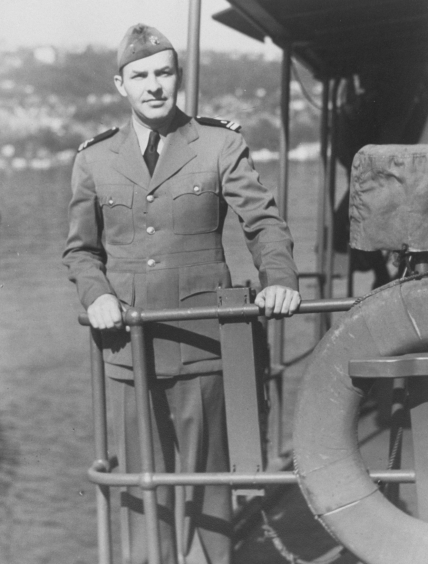 Black and white photo of Lieutenant Marvin Paulson, USC&GS, wearing the gray working uniform while serving aboard USS Surveyor.