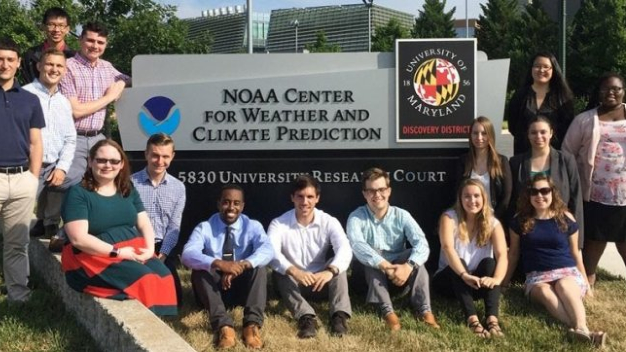 A group photo of NOAA Student Interns taken in front of the Center for Weather and Climate Prediction