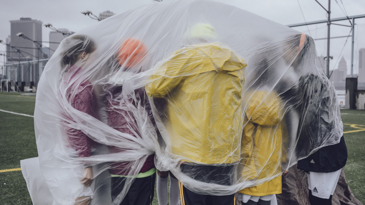 Rain caused this coach and his players to take a huddle under plastic sheeting during this soccer game in New York City in May. Spring 2017 was the 11th wettest spring on record, according to scientists from NOAA's National Centers for Environmental Information.